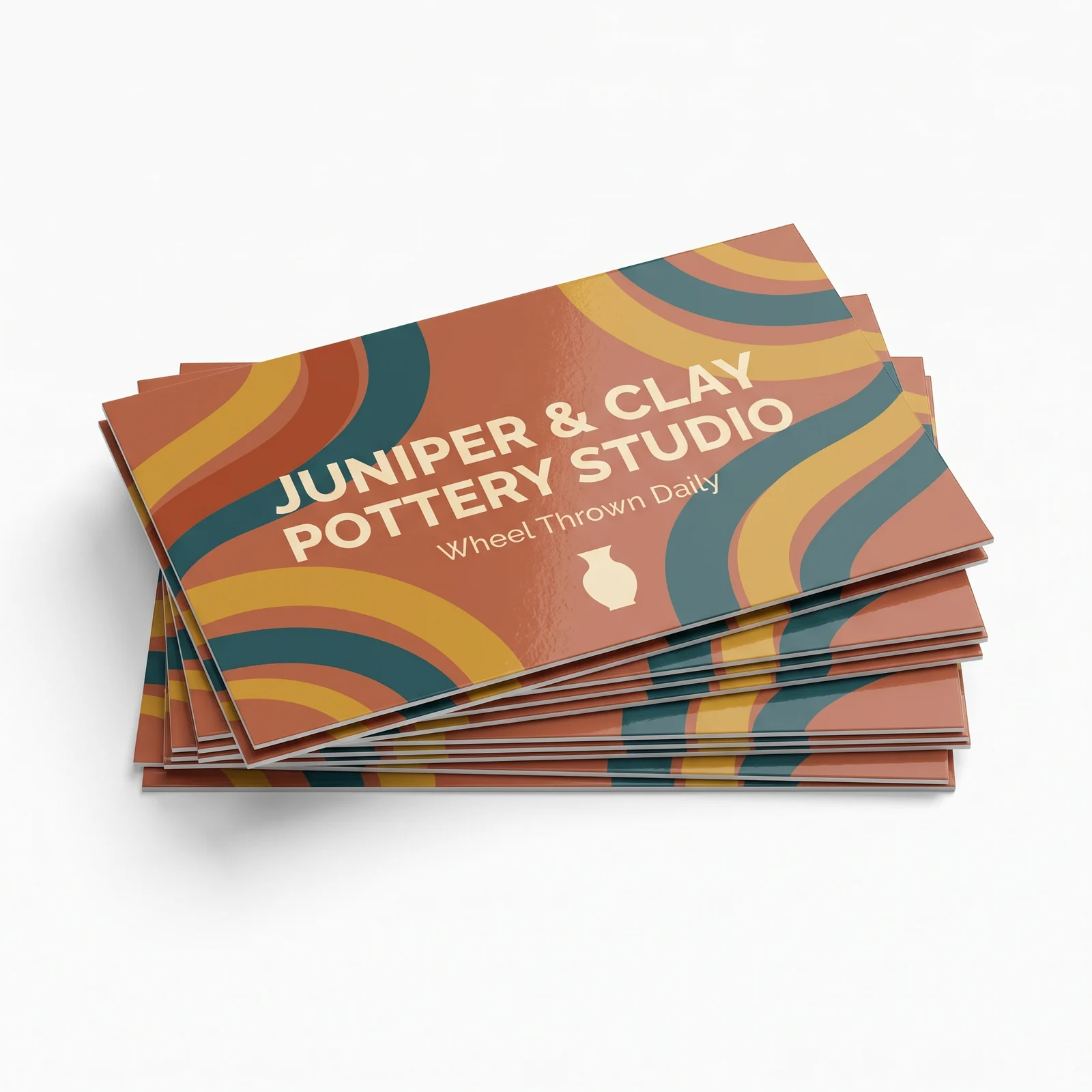 Stack of full color 16pt gloss business cards printed from a customer supplied file
