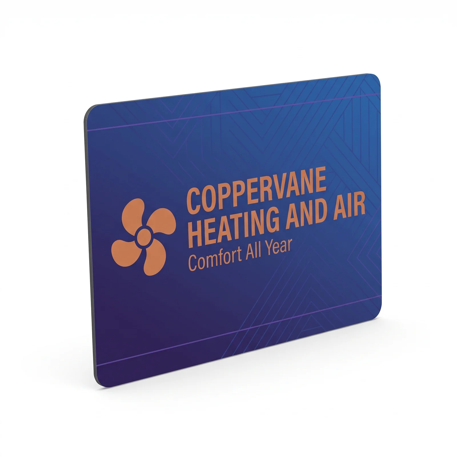 A full colour Coppervane Heating and Air vehicle magnet standing on a white studio ground, deep indigo to cobalt with a copper fan mark, the company name and the line Comfort All Year