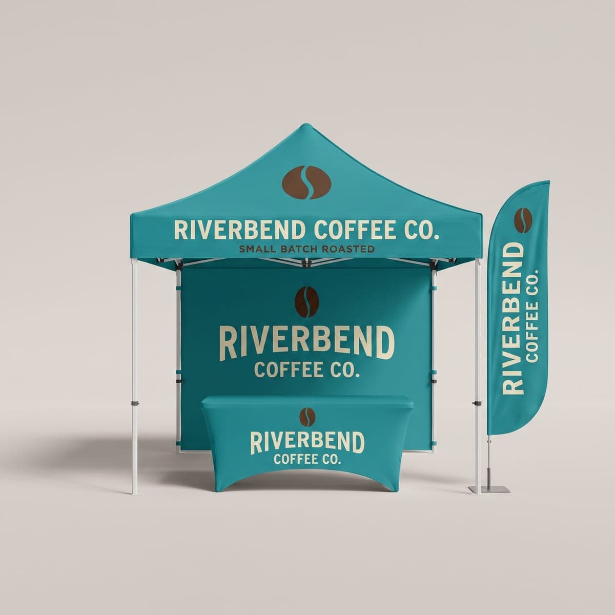 Complete teal Riverbend Coffee Co. canopy tent package with printed back wall, fitted table cover and feather flag in a studio