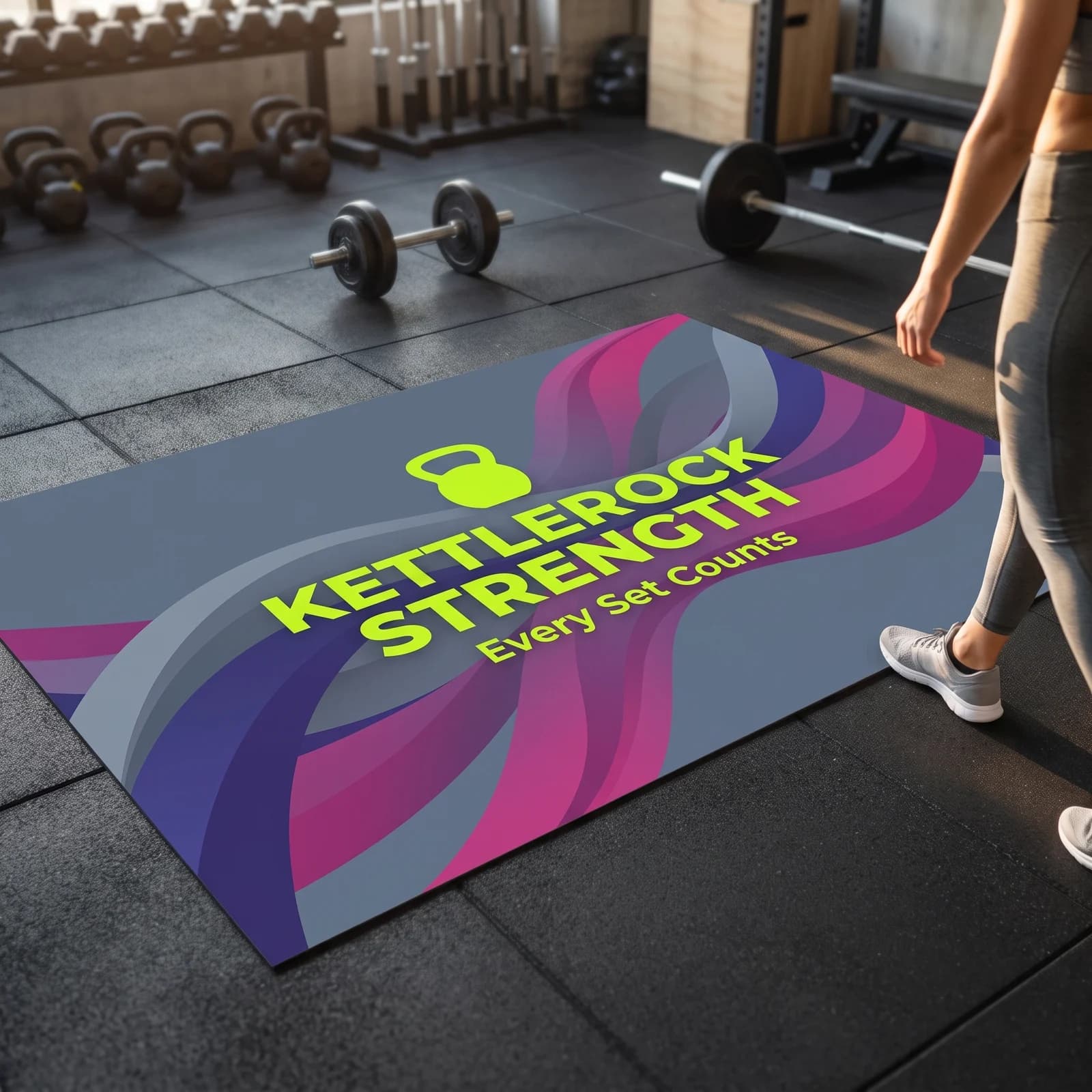 A floor graphic for Kettlerock Strength gym on indoor rubber gym tiles