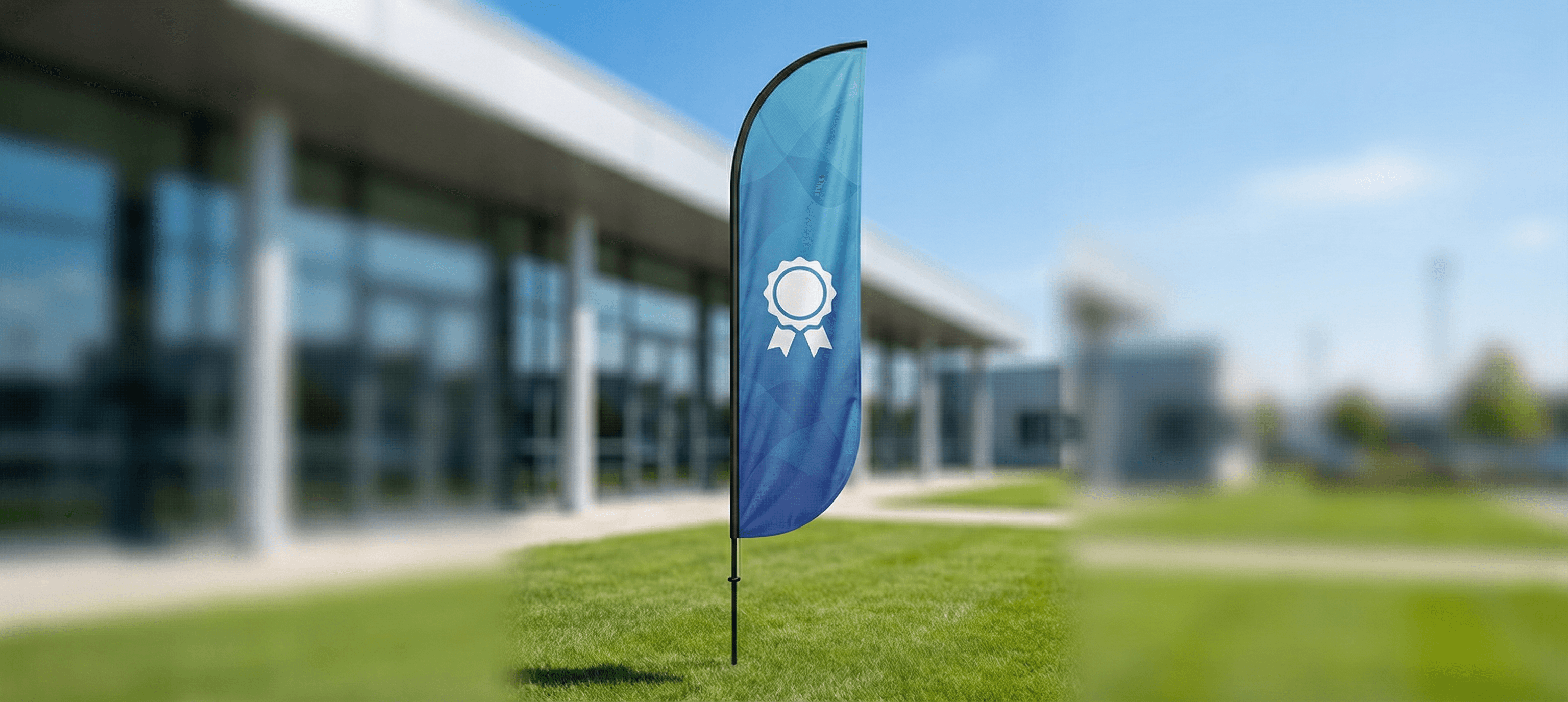 Feather advertising flag flying outdoors in front of a business