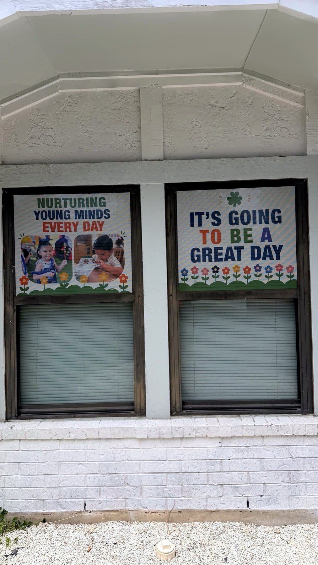 On-site photo of the Growing Minds front windows after the panels went on