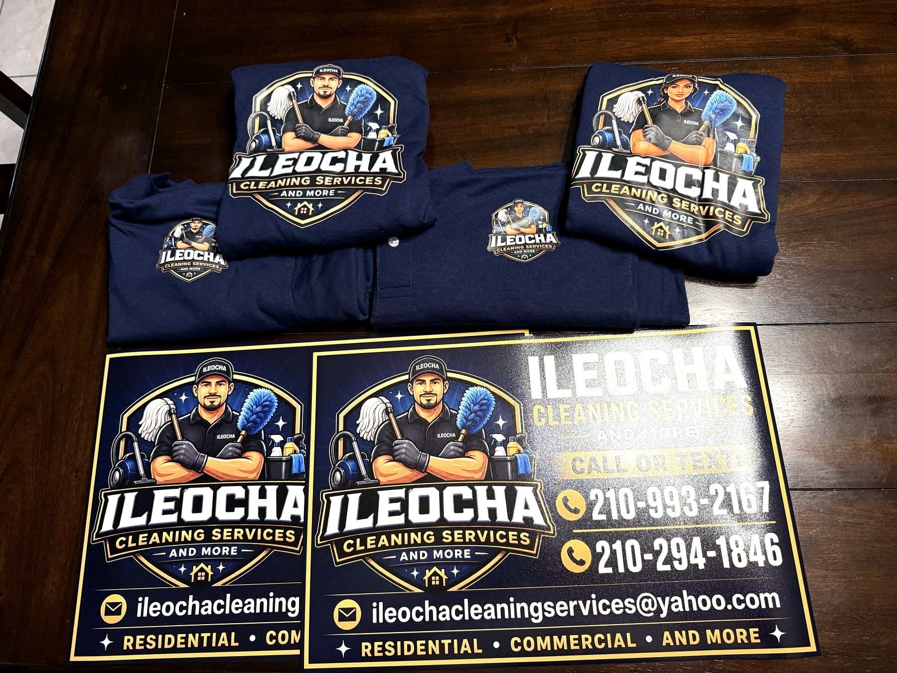 Delivery photo of the Ileocha magnets and crew shirts laid out before handoff
