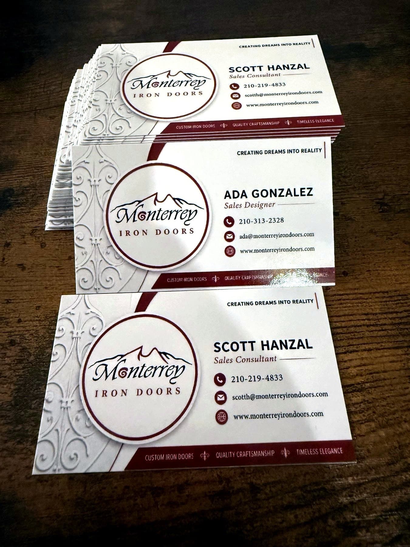 Delivery photo of the Monterrey Iron Doors card stacks on the table before handoff