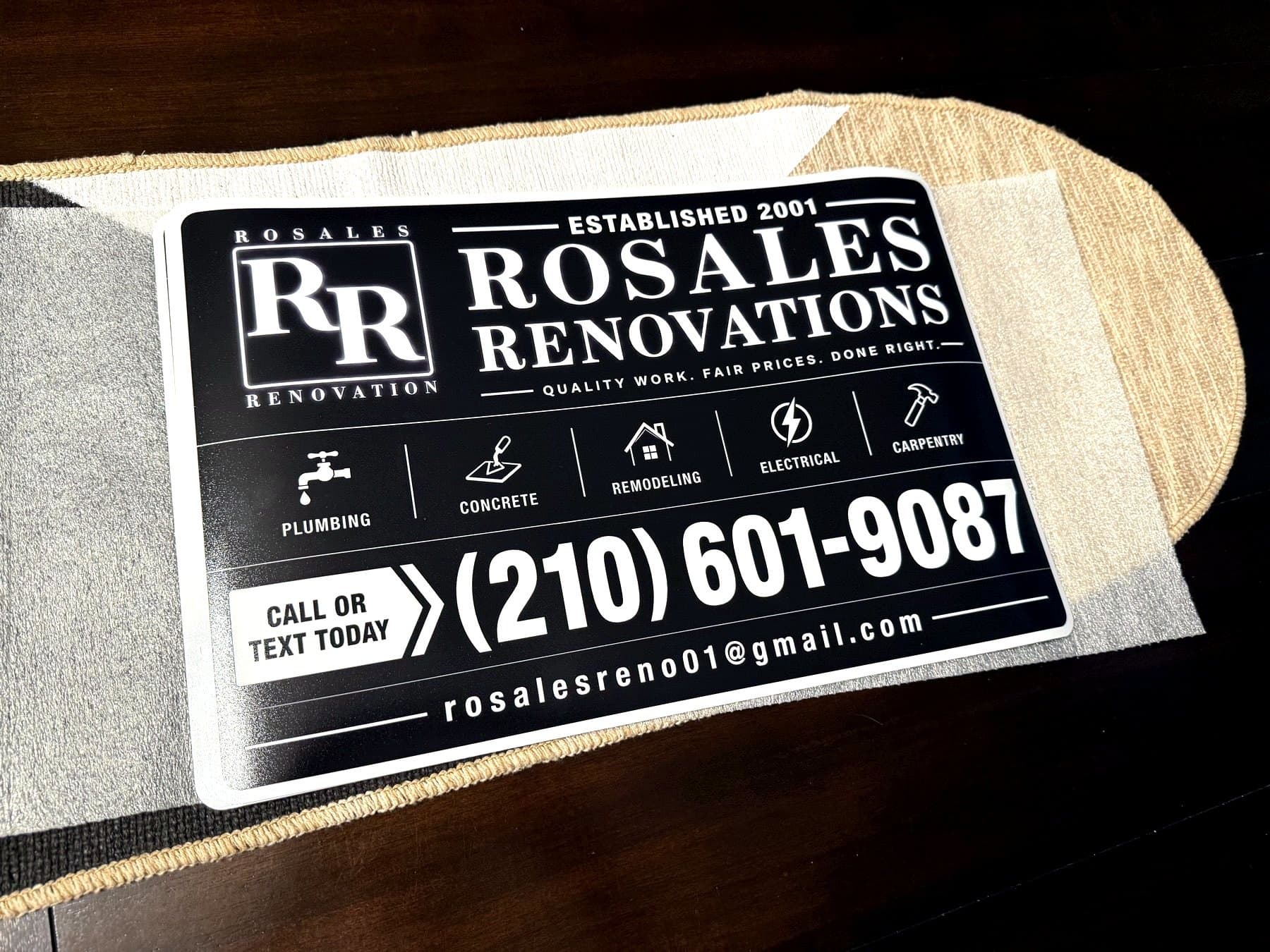 Delivery photo of the Rosales Renovations magnet photographed flat before delivery
