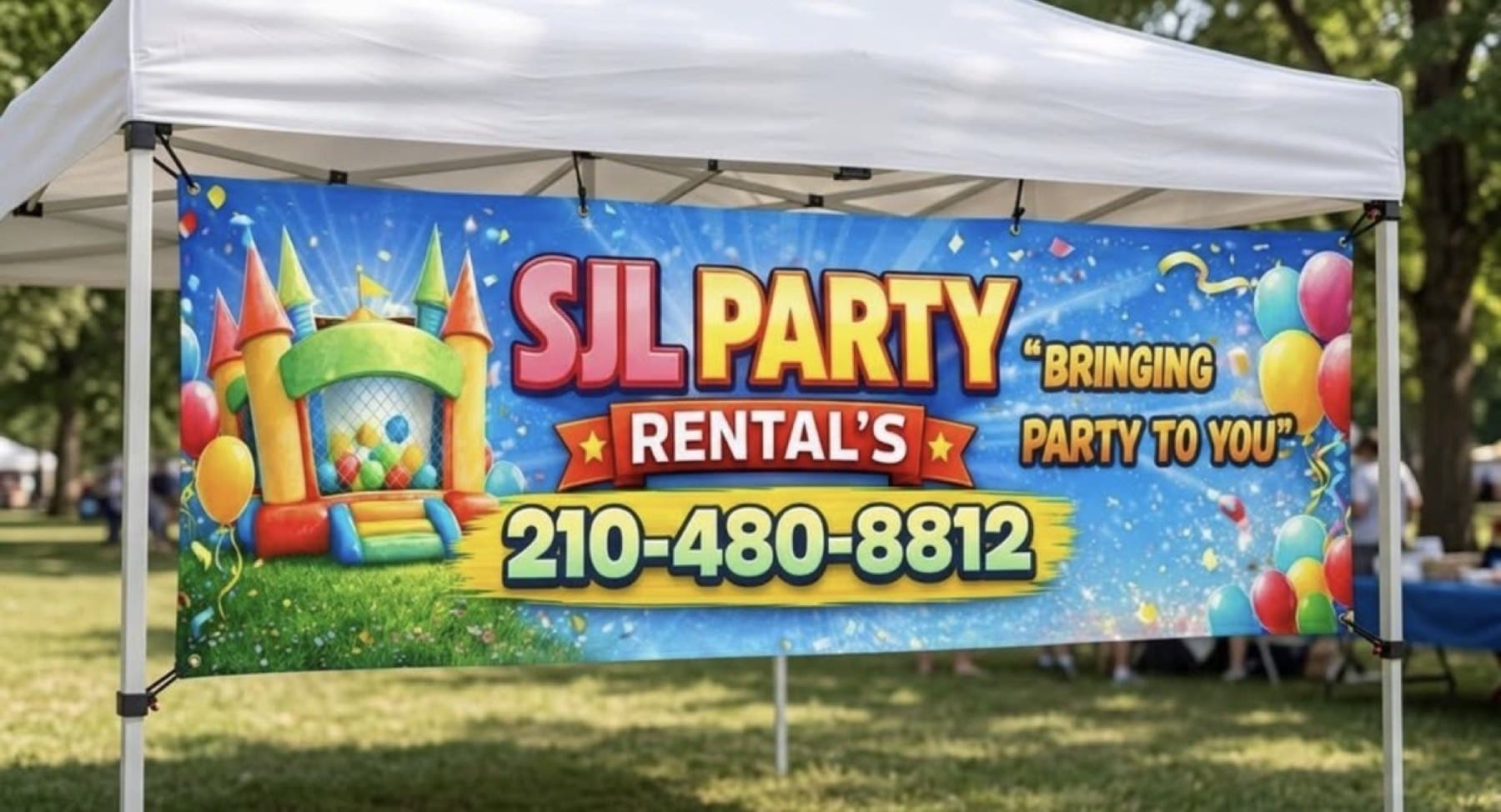 Install-day photo of the SJL Party Rentals banner on the canopy at the event, taken on site