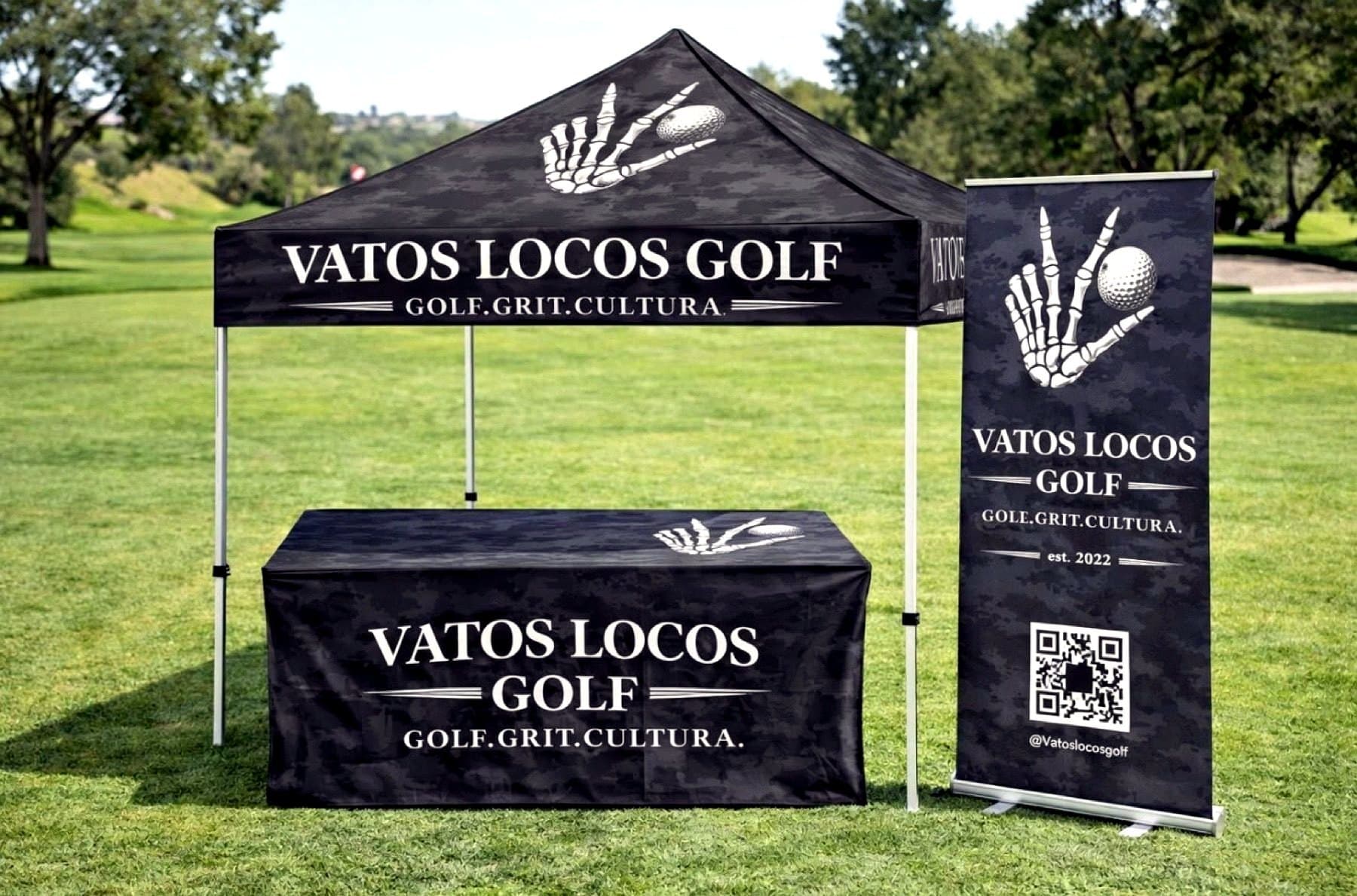 Event photo of the Vatos Locos Golf canopy, table cover and banner set up on the course
