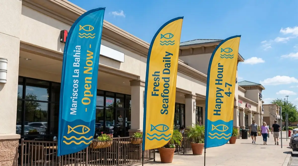 Custom printed advertising flags displayed outdoors for a business