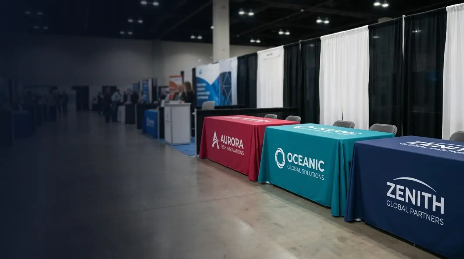 Custom printed table cover with business branding at an event table