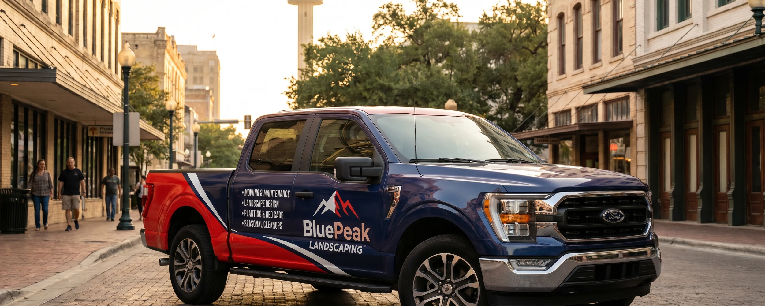 Fully wrapped commercial vehicle with branded graphics on a San Antonio street